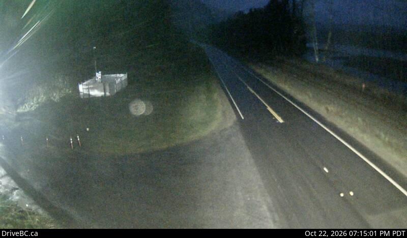 DriveBC camera: Highway 16 at Kasiks resort area about 60 km west of Terrace, looking east.