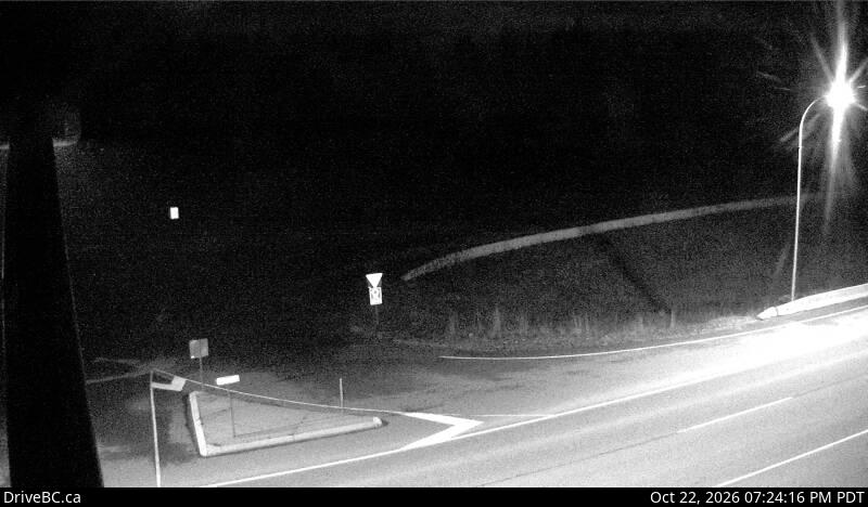 DriveBC camera: Highway 97 at Sales Road about 10 km south of Quesnel, looking east.